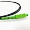 armoured fiber optic patch cord 1 mt, single mode sfm cable 3mm tpu black, il 0.15db, green sc apc connector